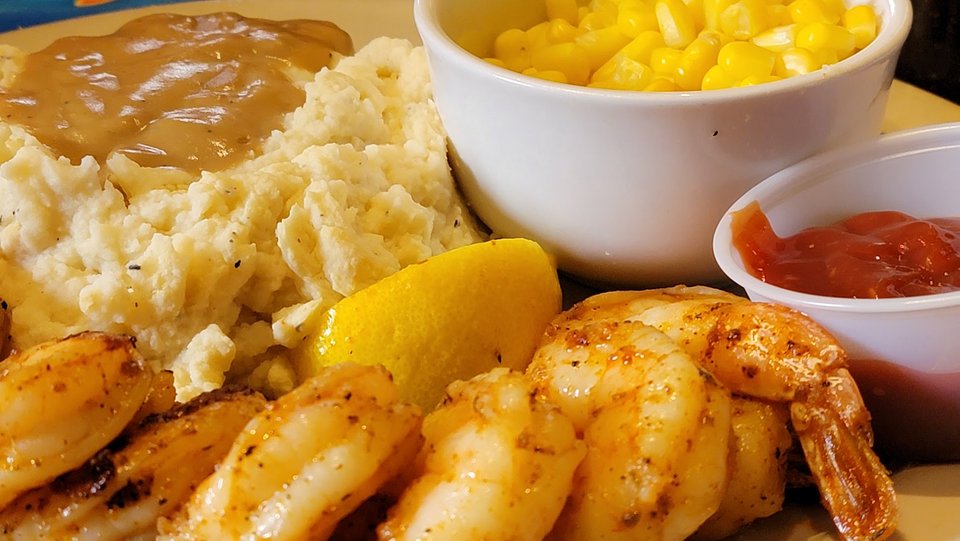 A table of Southern-style meals and sides.