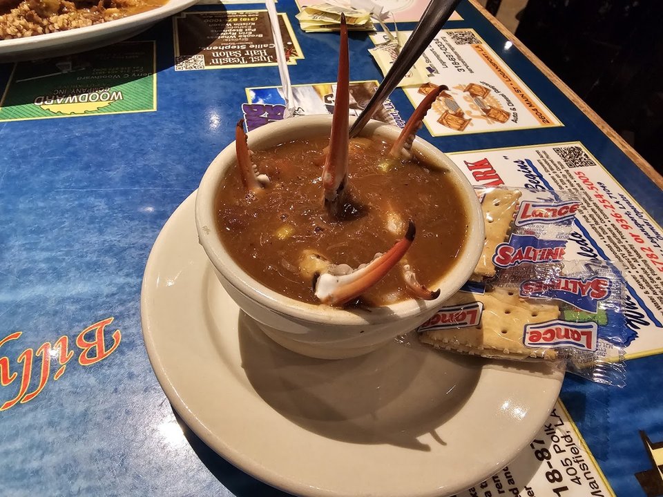 Warm dining room with Cajun restaurant food.